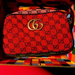 Gently used Multi-Color Gucci camera bag. Worn twice. Aunthentic